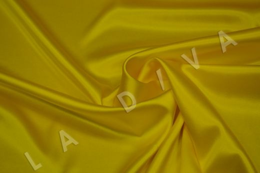 Атласный шелк желтого цвета